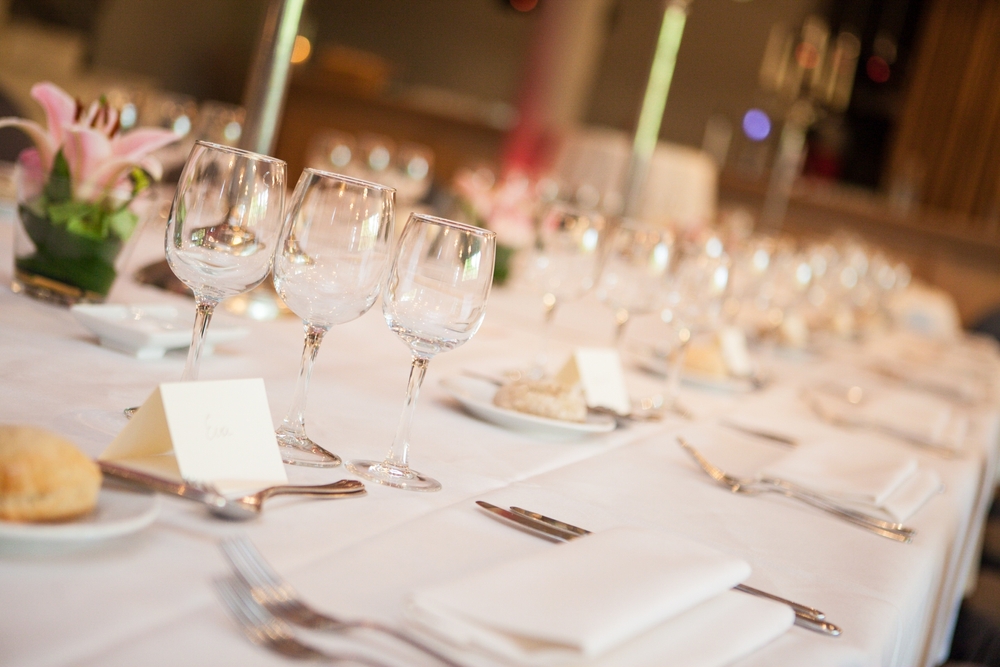 Beautiful table setup with glassware and flowers for a special event
