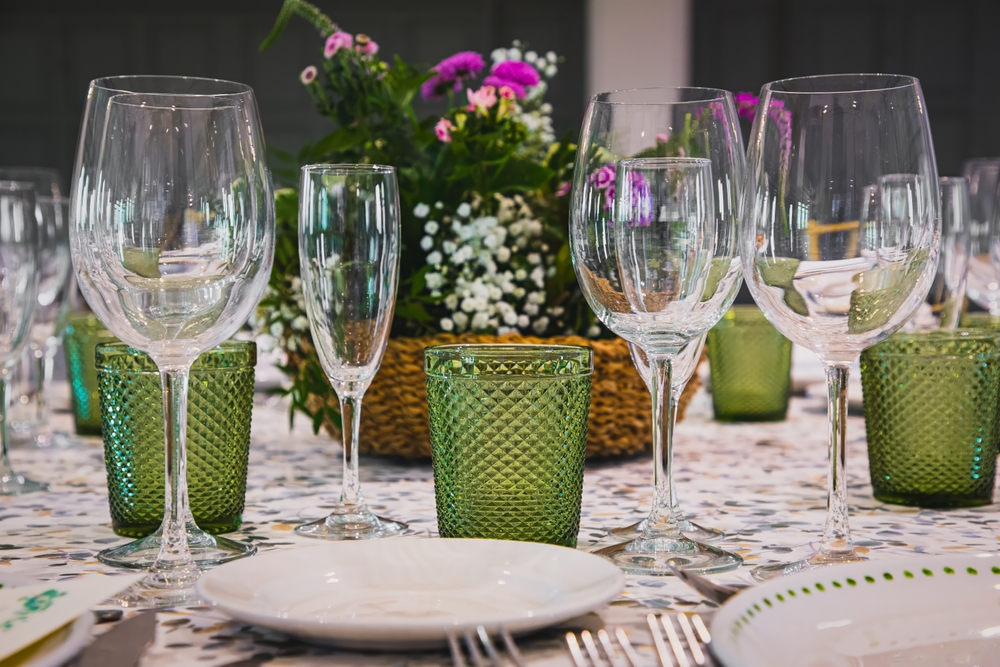 Elegant table setting with crystal glassware and floral centerpiece for formal dining