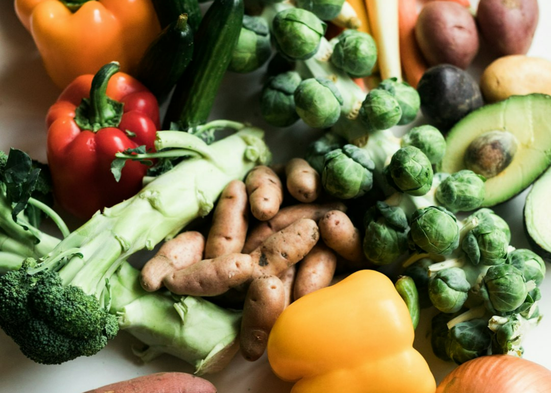 sliced carrots and green vegetable