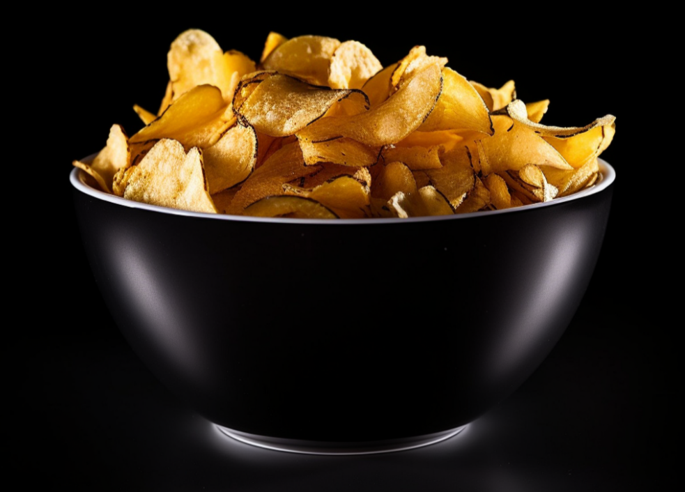 File:Potato chips in black background.png