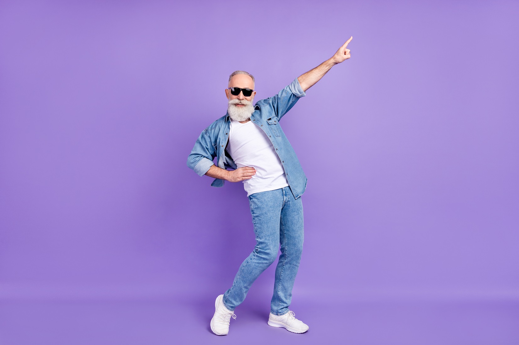 Full body photo of senior man happy, dancing.