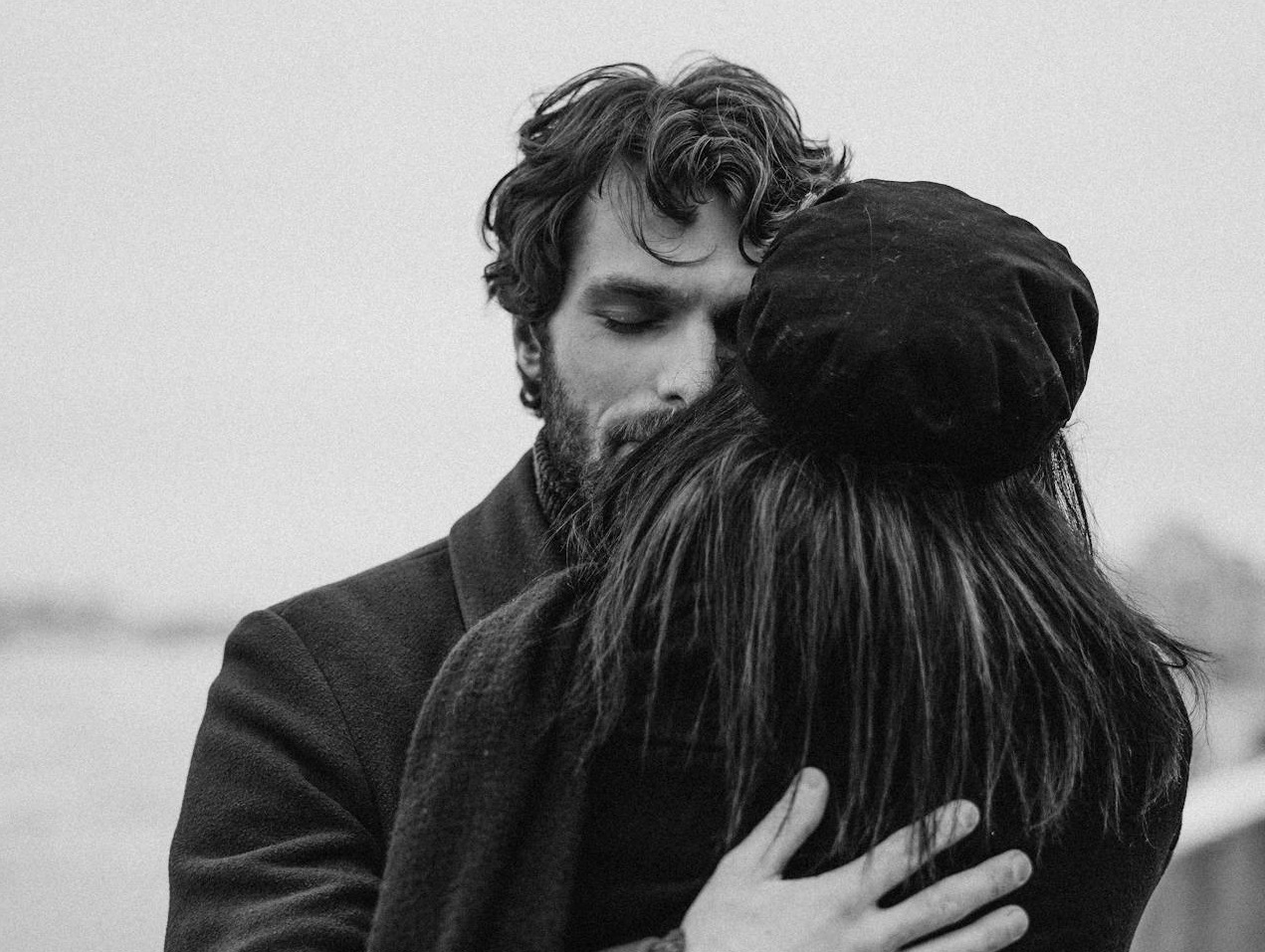 Man and Woman Hugging Each Other