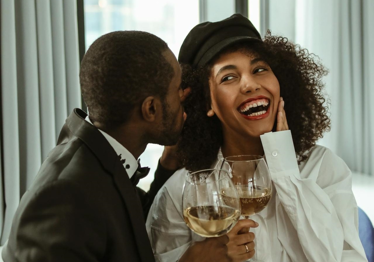 Couple are talking and smiling.