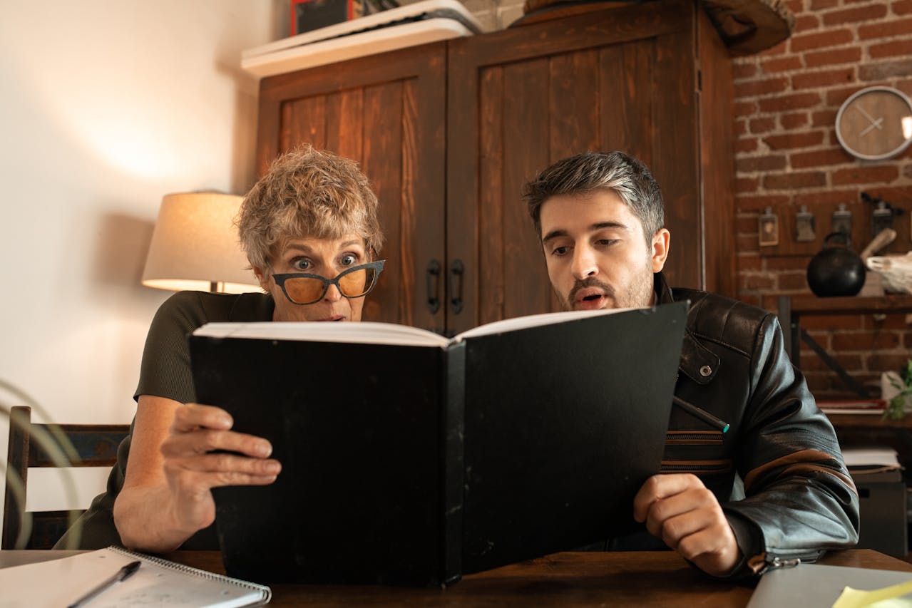 Man and Woman reading a book