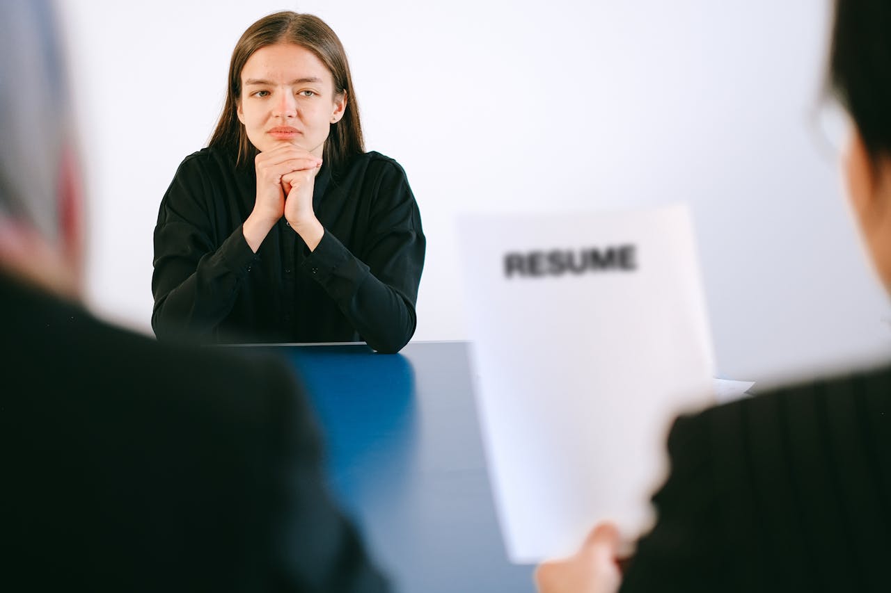 Woman in Shirt Sitting and Have a job Interview.