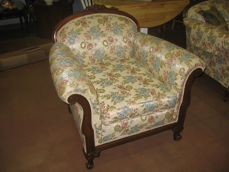 Close-up Photo of Antique chair displayed in a n antique furniture store