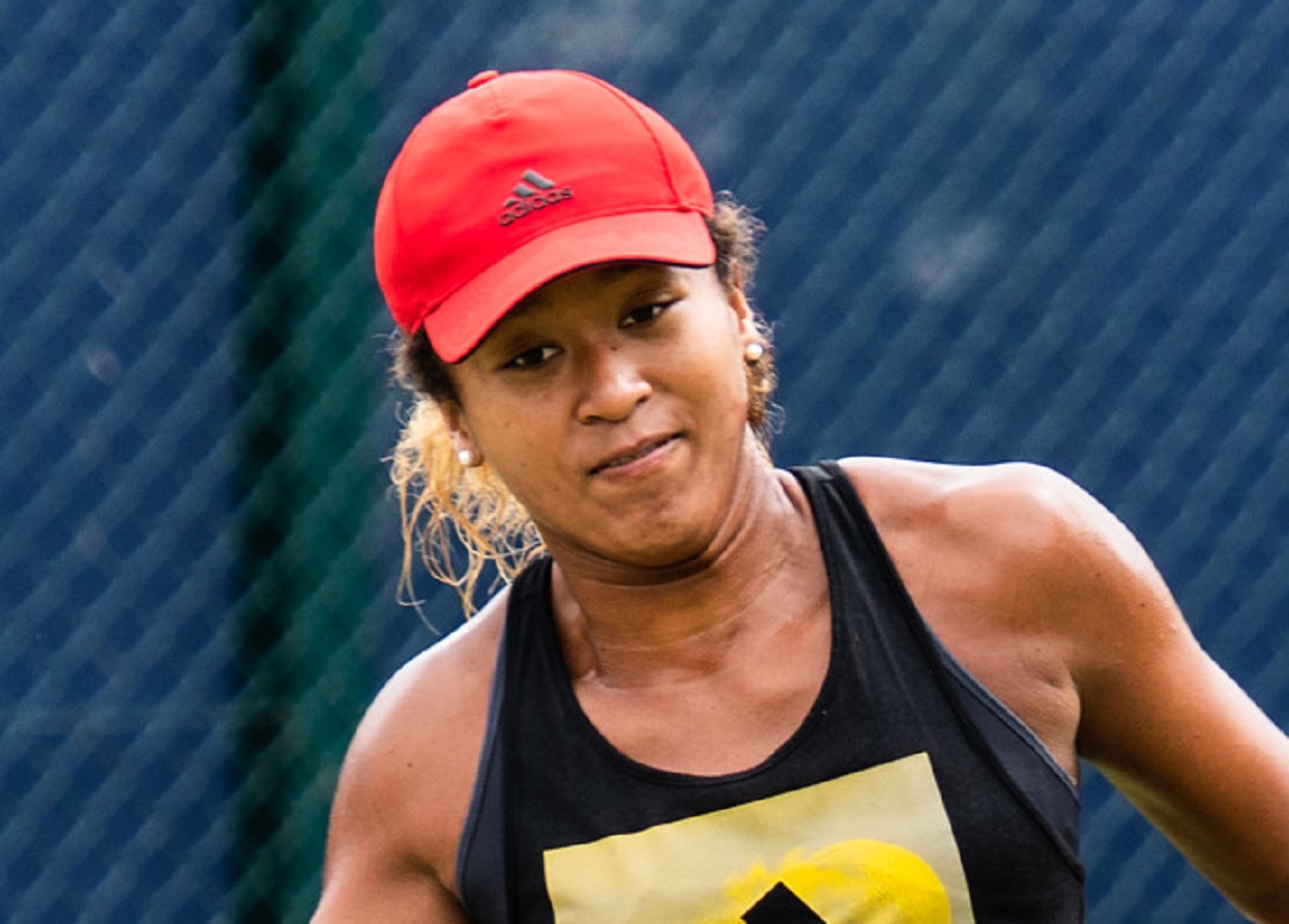 Naomi Osaka playing tennis.