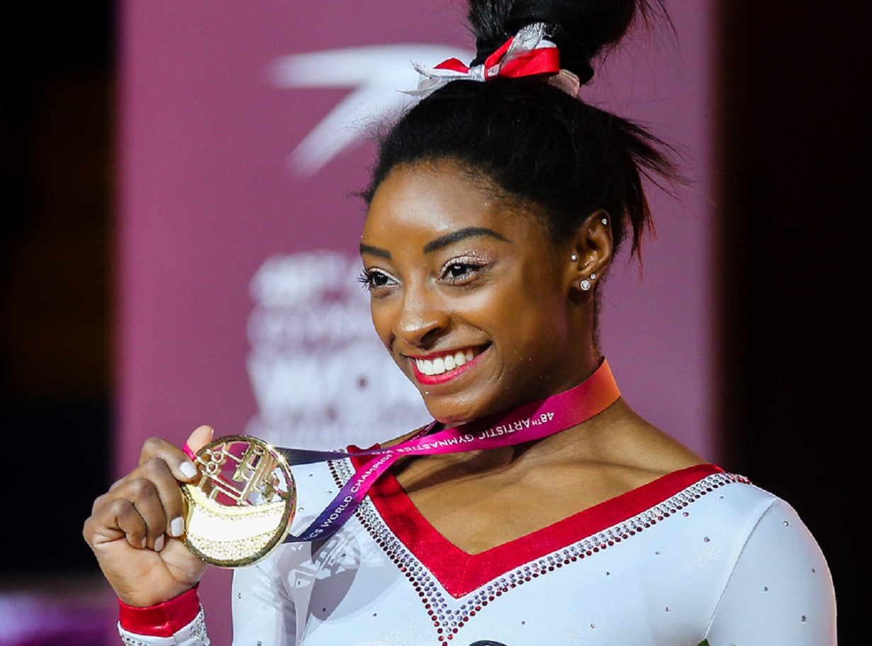 Simone Biles getting a medal - 2018