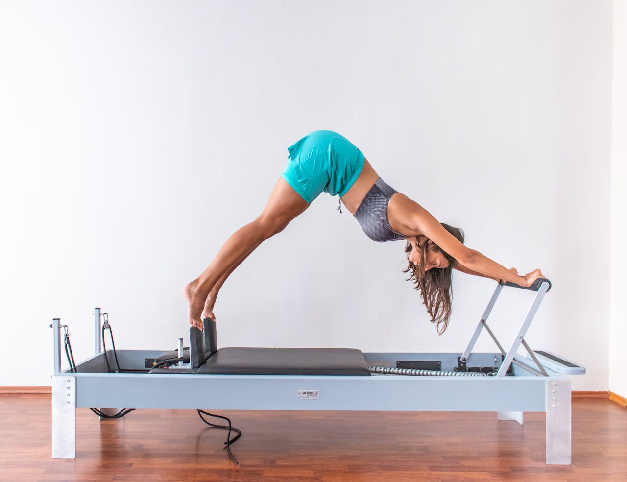 Woman Doing Pilates Exercise