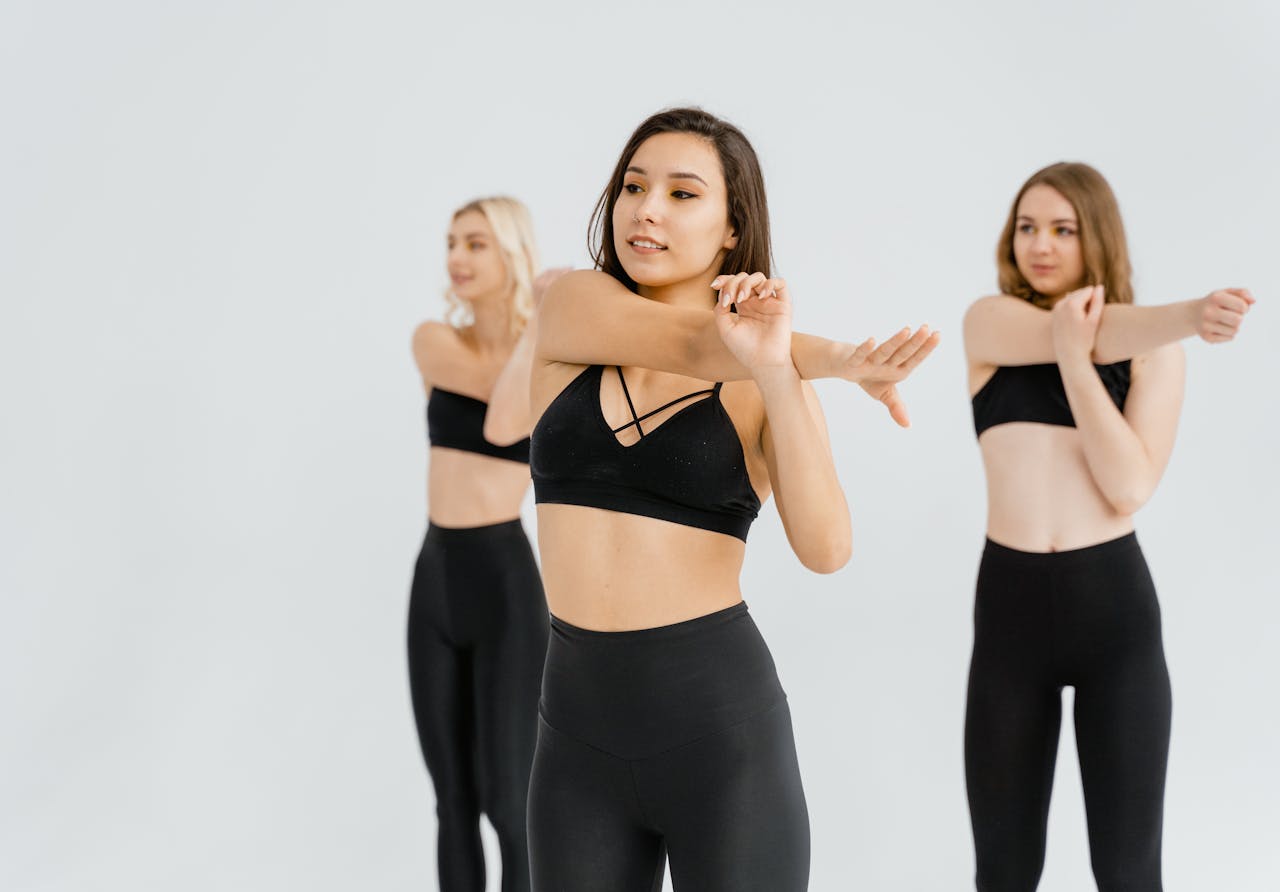Women in Black Sports Bra and Leggings