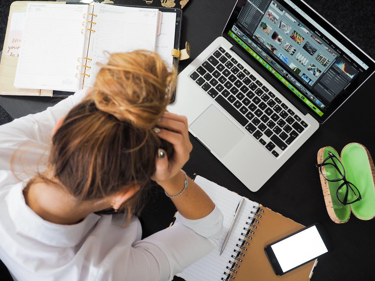 Woman Sitting in Front of Laptop