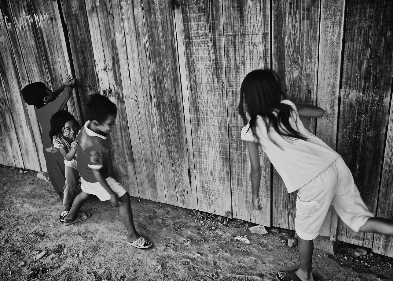 Small children are playing outside (B&W Image)