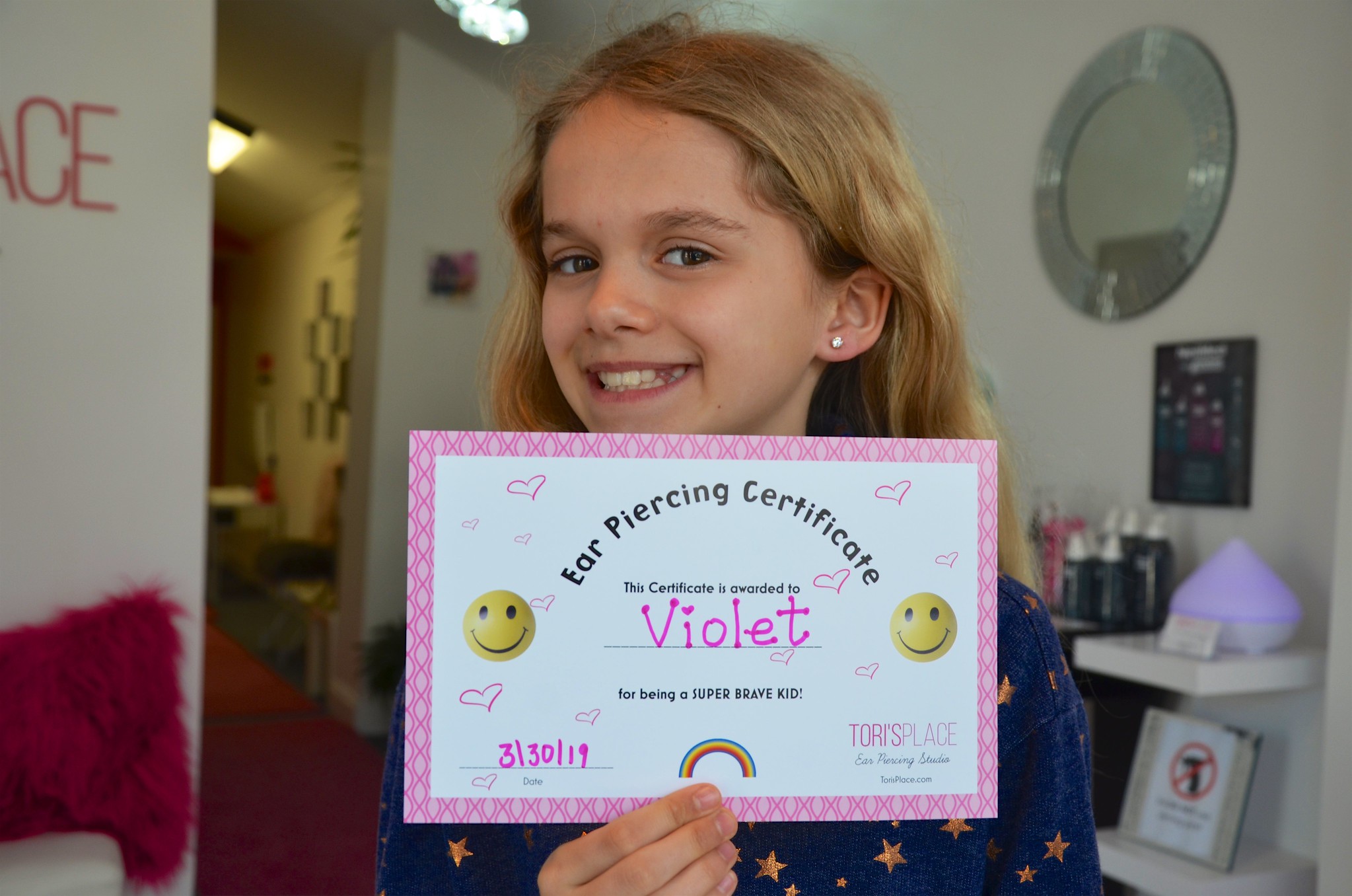 Girl And Her Ear Piercing Certificate