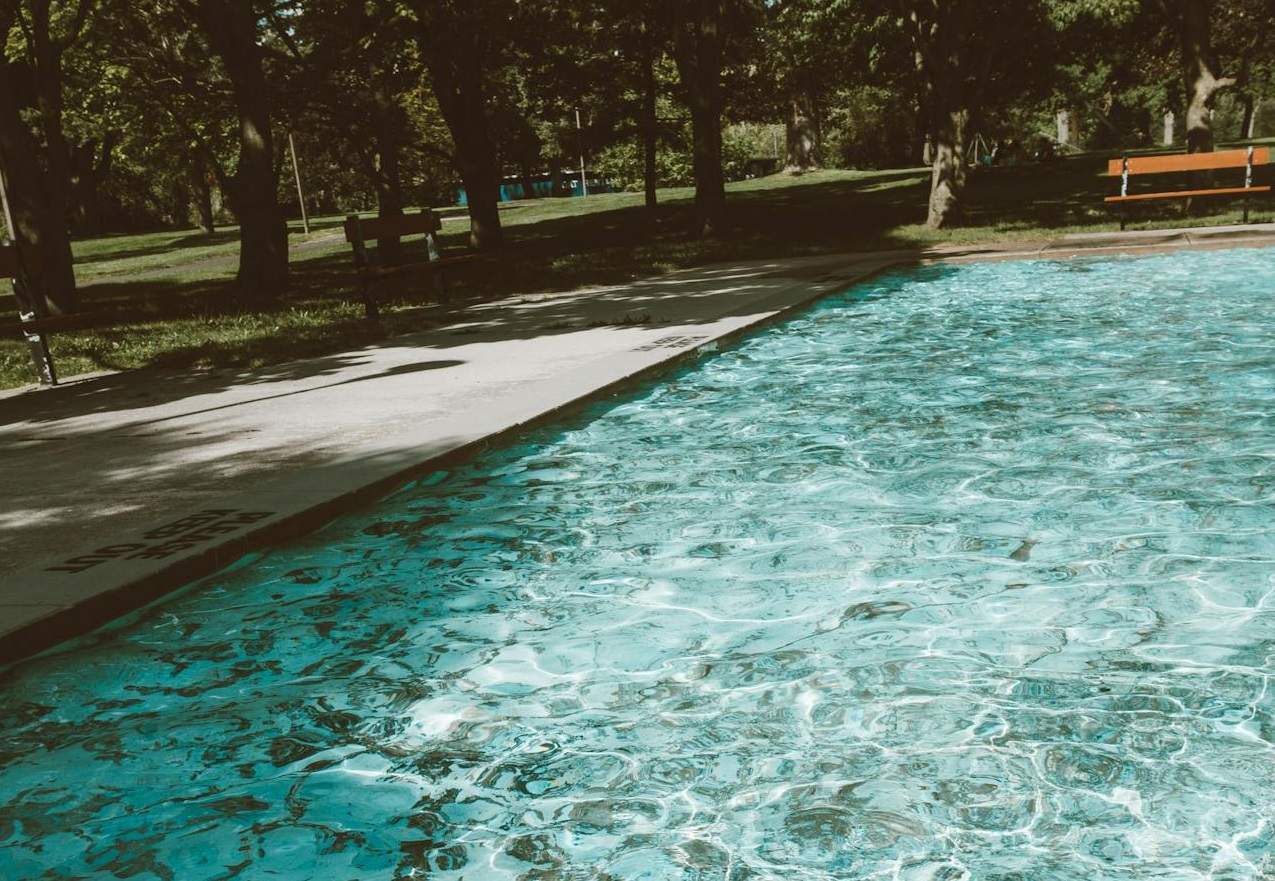 Small public pool in green park
