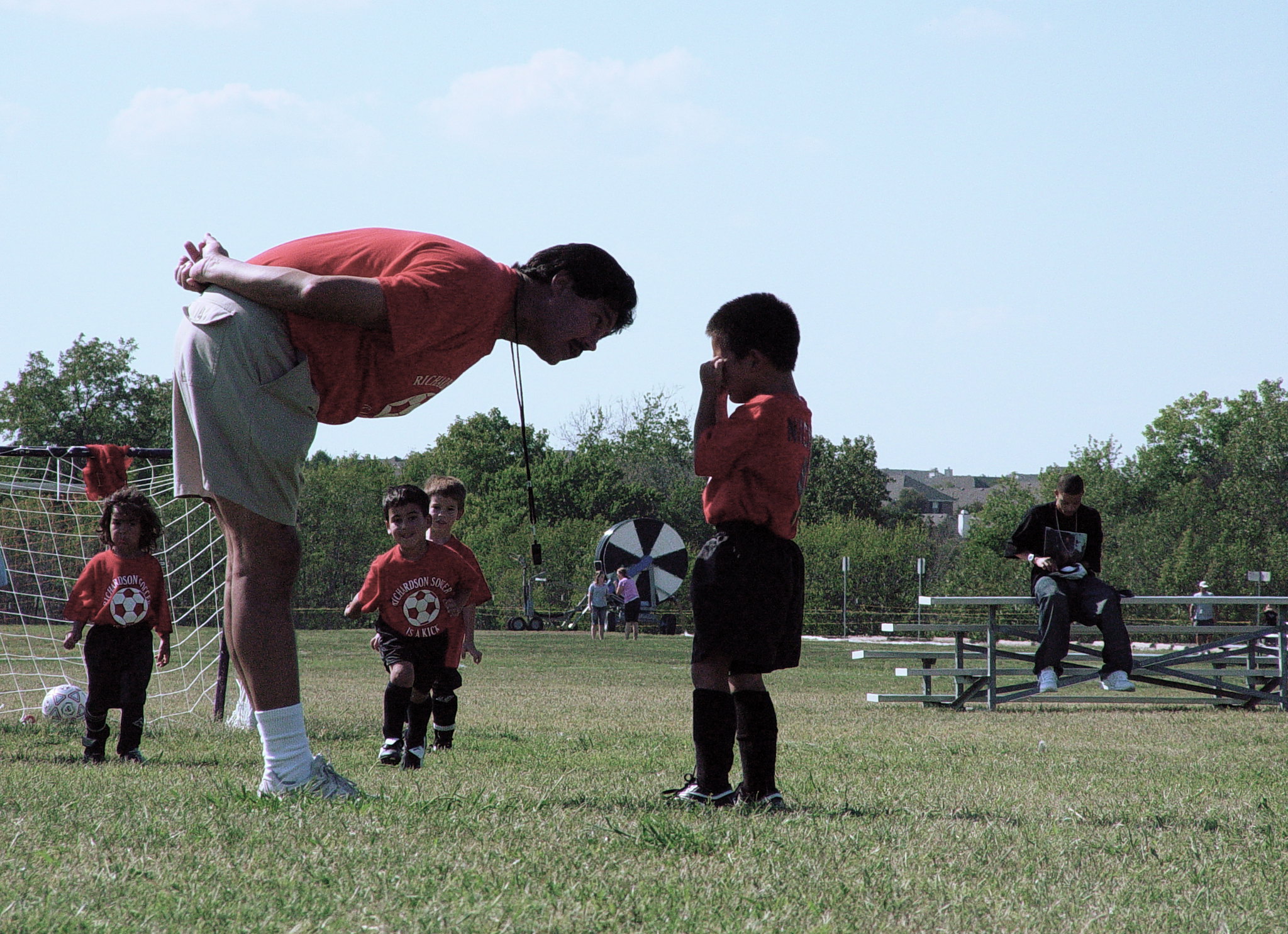 Teacher is yelling at kid outside.