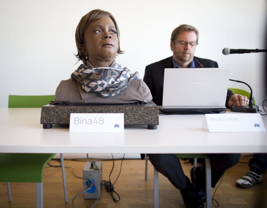 The robot lady Bina48 talks to her designing engineer Bruce Duncan