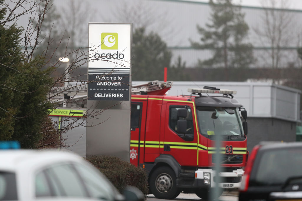 Firefighters at the scene of Ocado robotic warehouse