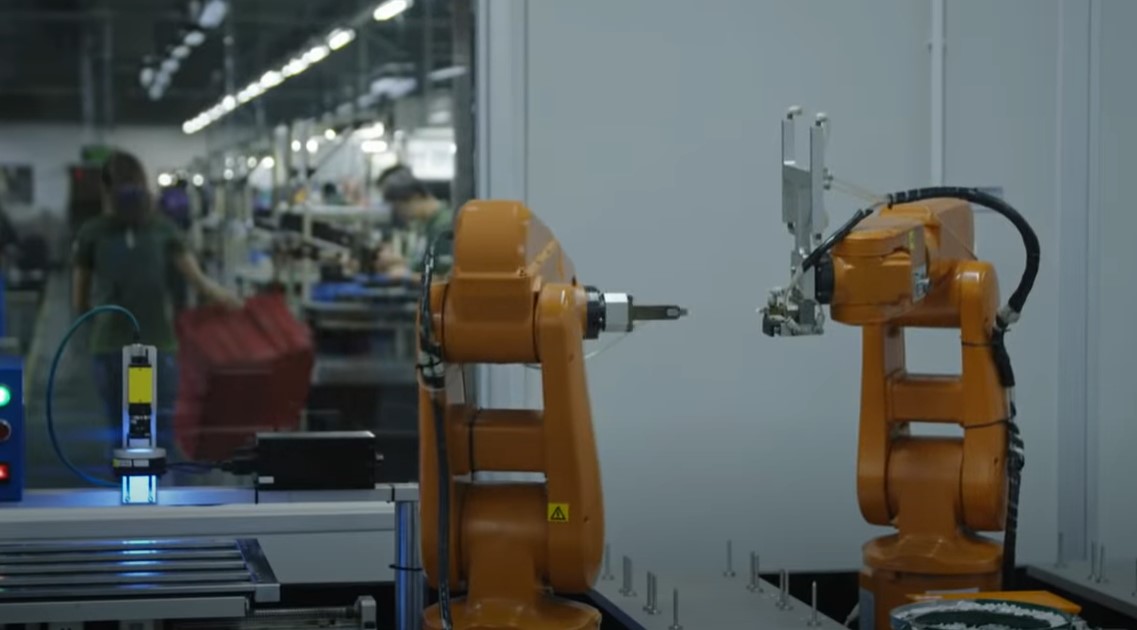 image of two arms robots