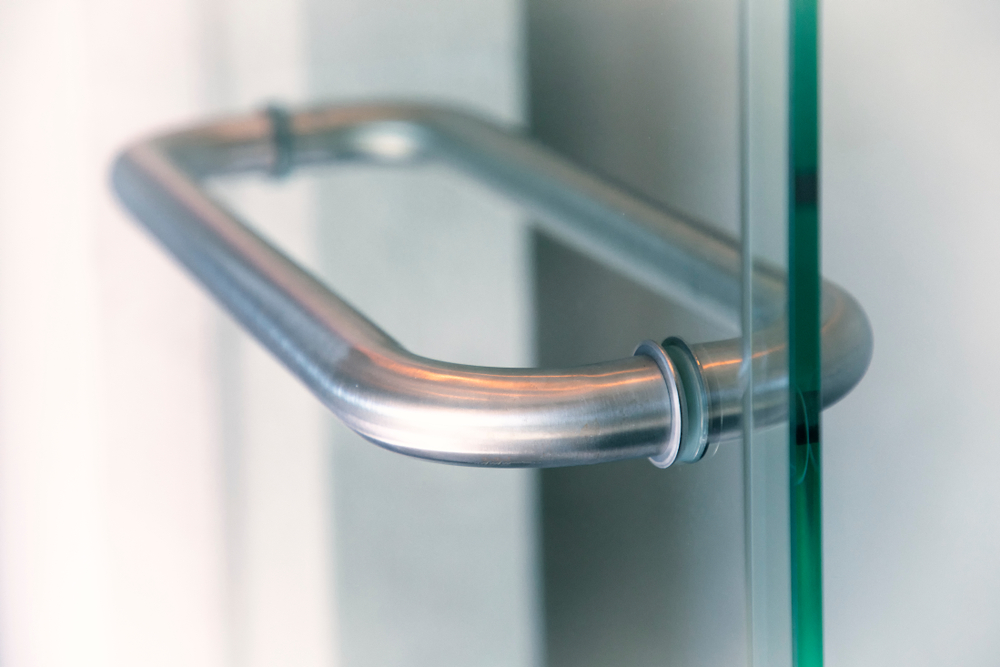 Silver Glass door handle of a glass door