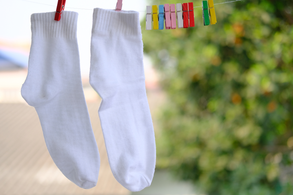 Socks hanging on a clothesline