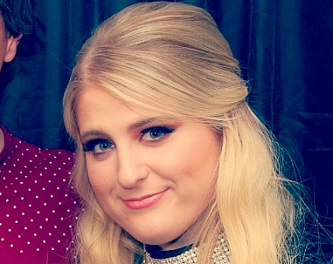 Meghan Trainor is smiling at camera - 2015