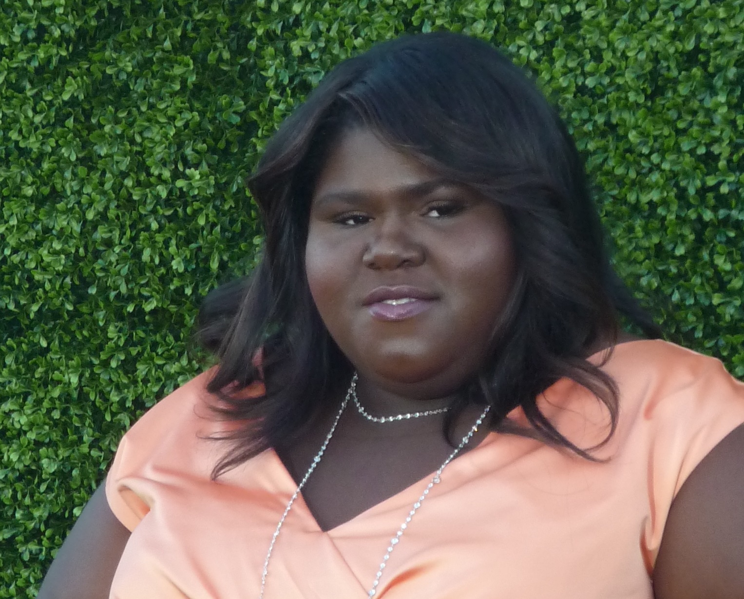 Gabourey Sidibe smiling outside.