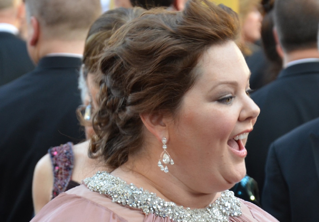 Melissa McCarthy smiling and looking at front.