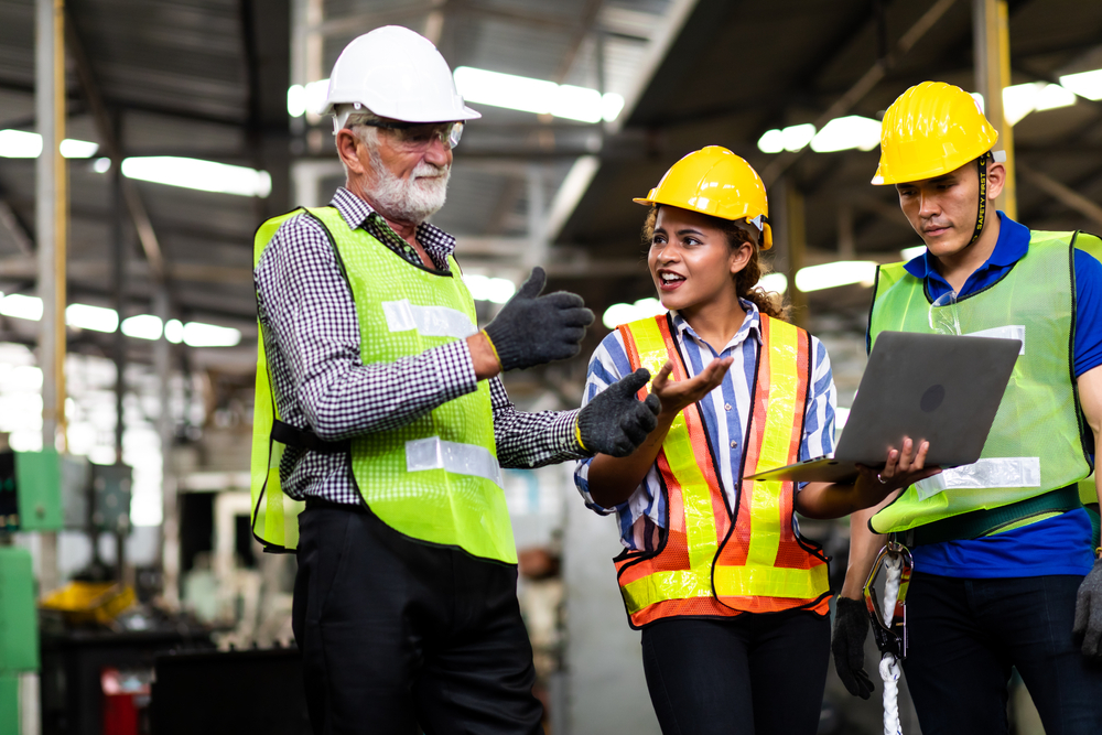 Professional Mechanical Engineer team Working on Personal Computer