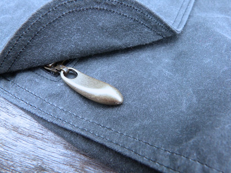 Close Up Photo of Waxed Canvas Jacket