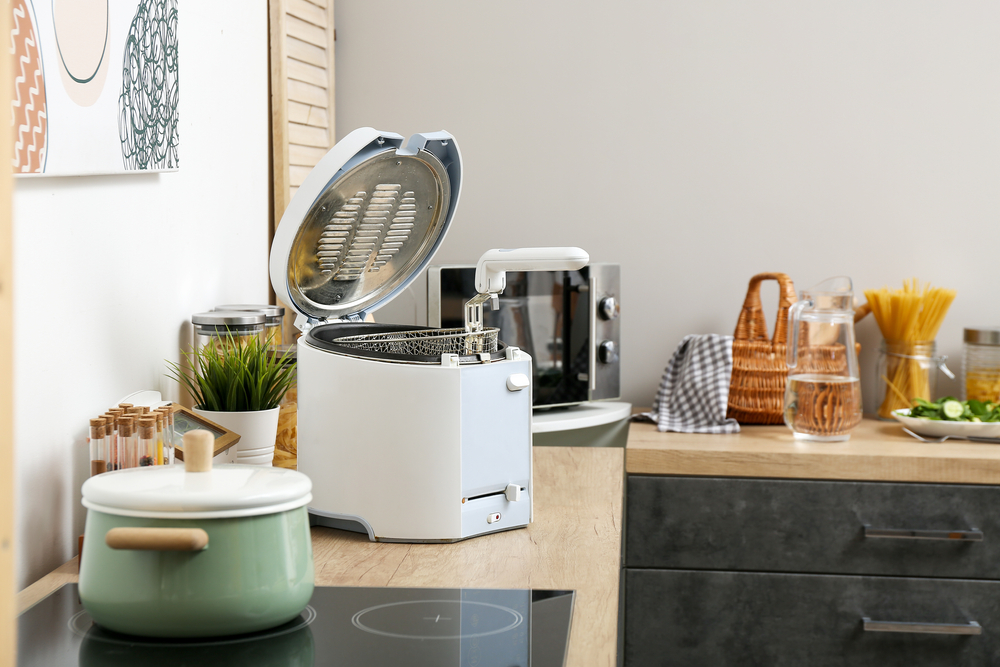 Close Up Photo of Modern deep fryer