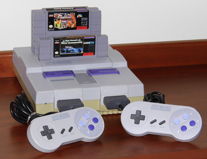 Close Up Photo of Vintage Super Nintendo Console