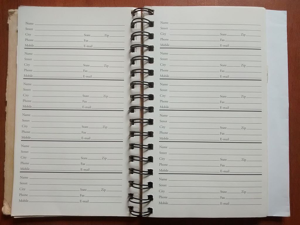 Close Up Photo of A blank page in a typical paper address book.