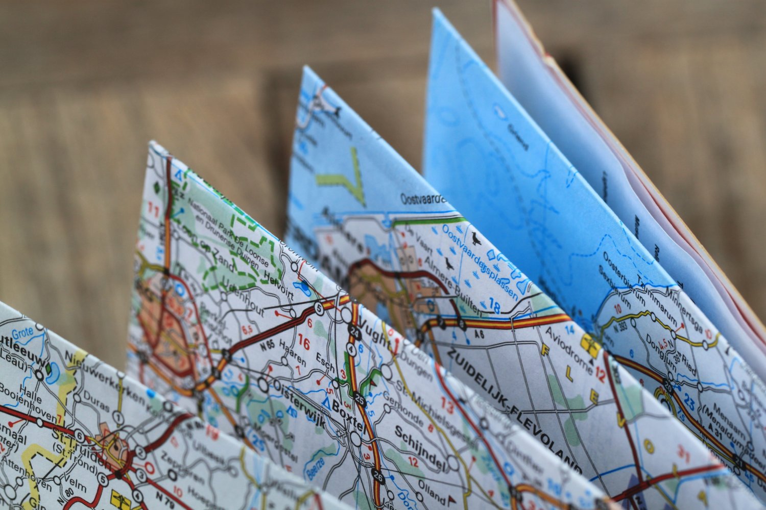 Close Up Photo of Folding Road Map.