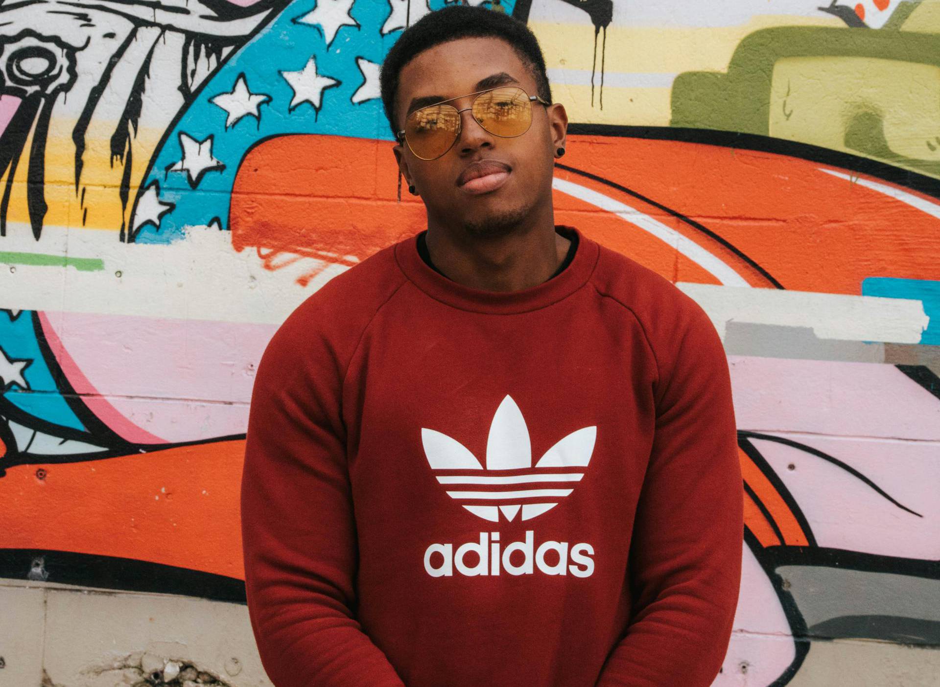 Man in adidas sweatshirt