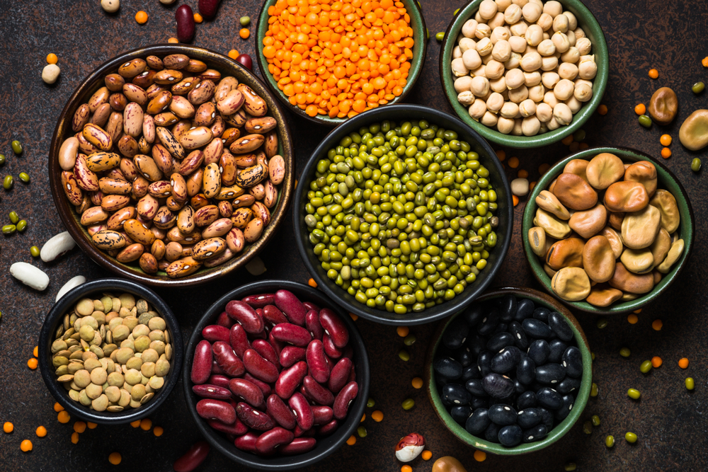 Legumes and beans assortment in different bowls
