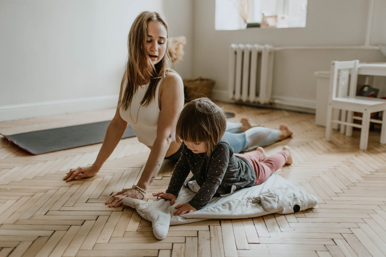 woman and kind doing yoga