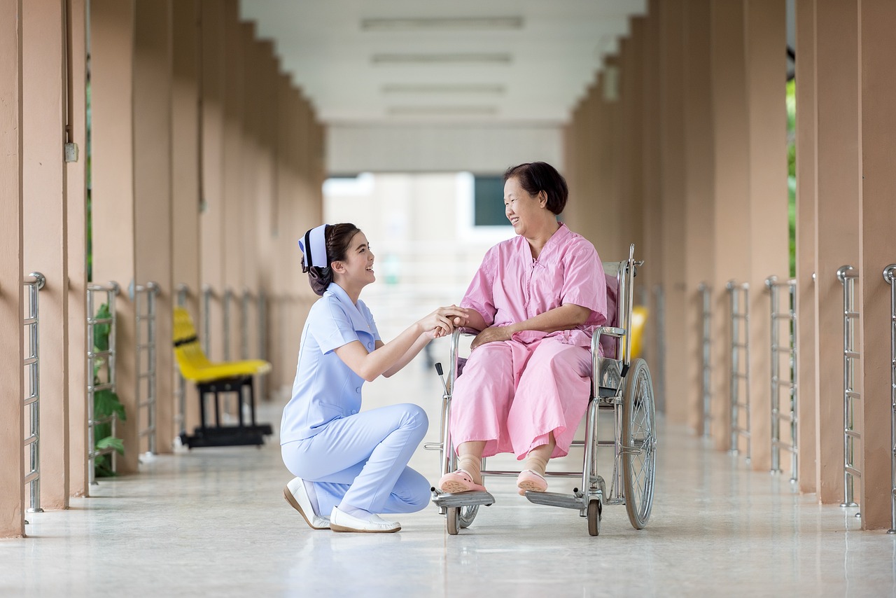 Photo of a Nurse Caretaking a Patient