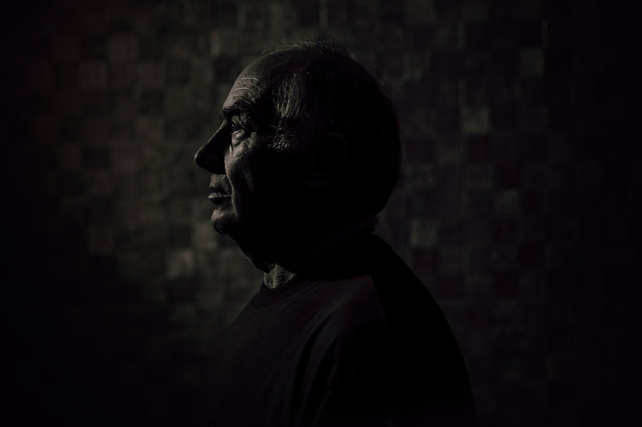 Grayscale Portrait Photo of a Man in Black Top