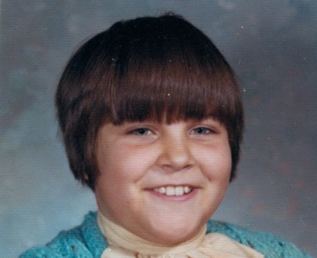 Kid with Long Bowl Hair Cut.