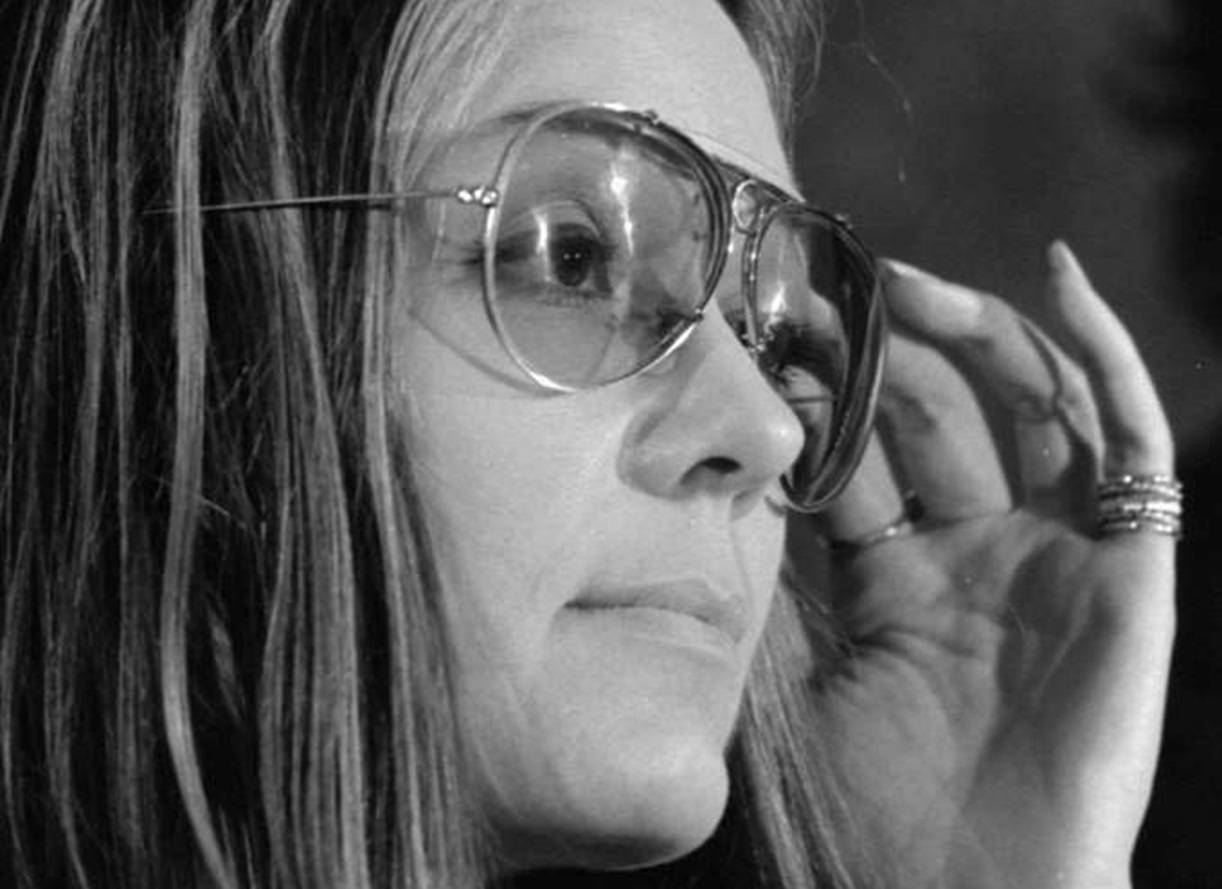 Gloria Steinem at news conference with sunglasses - 1972