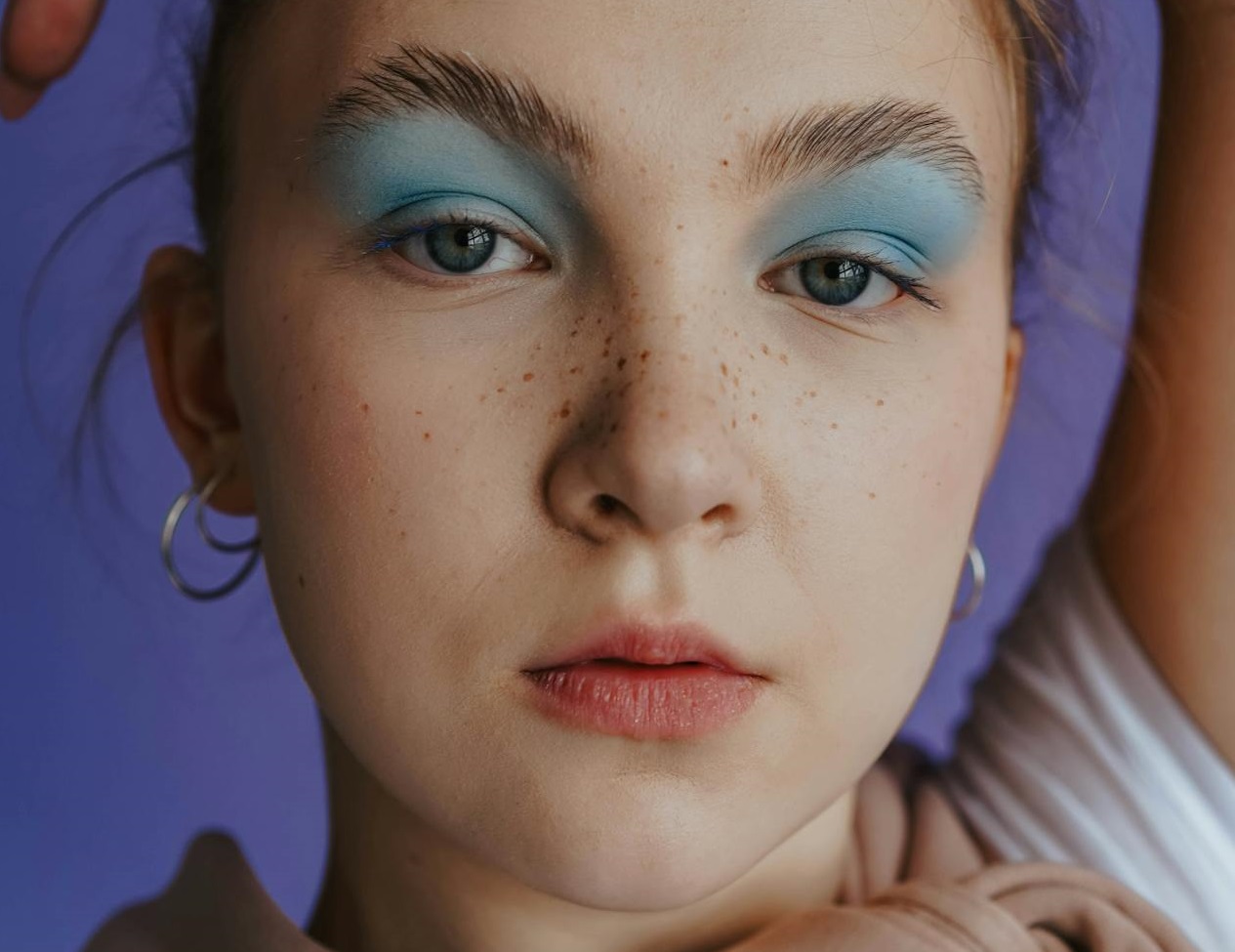Woman Posing with Blue Eyeshadow