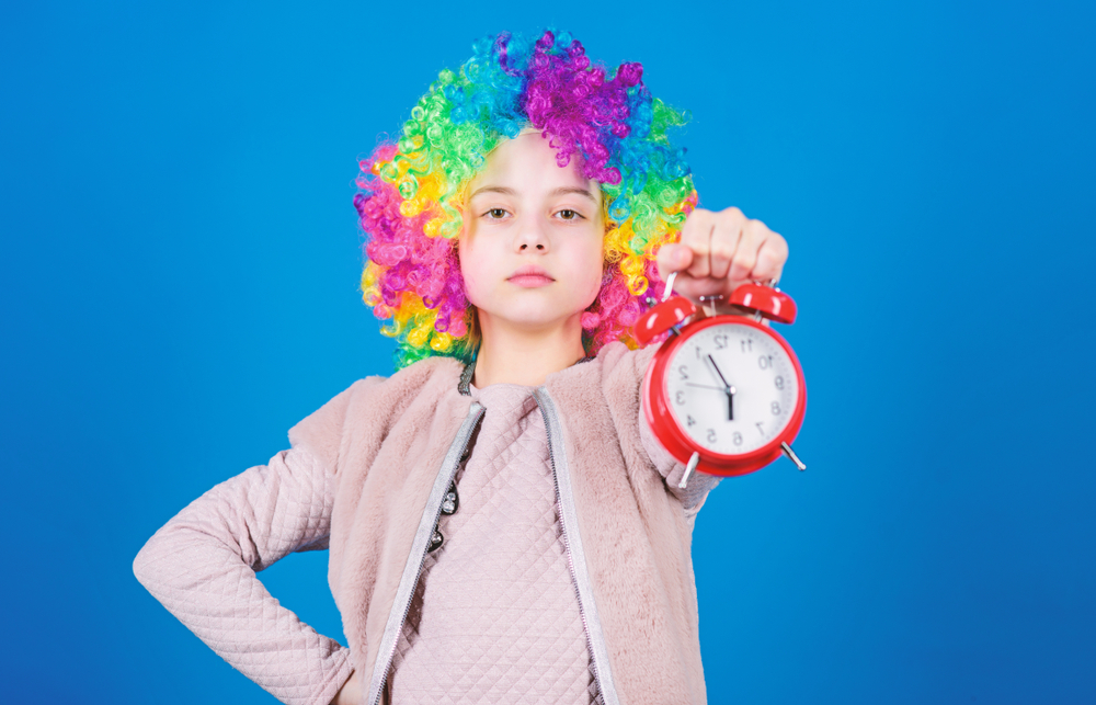 Cute little child demanding punctuality