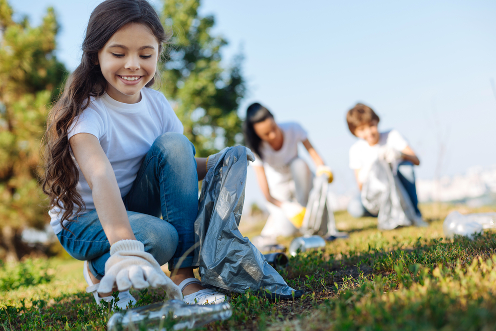 Kind children doing school tasks