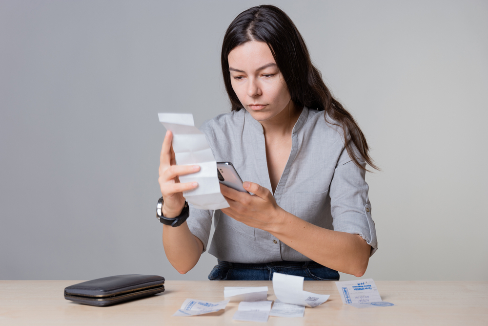 Portrait Photo of a woman keeping track of her finances.