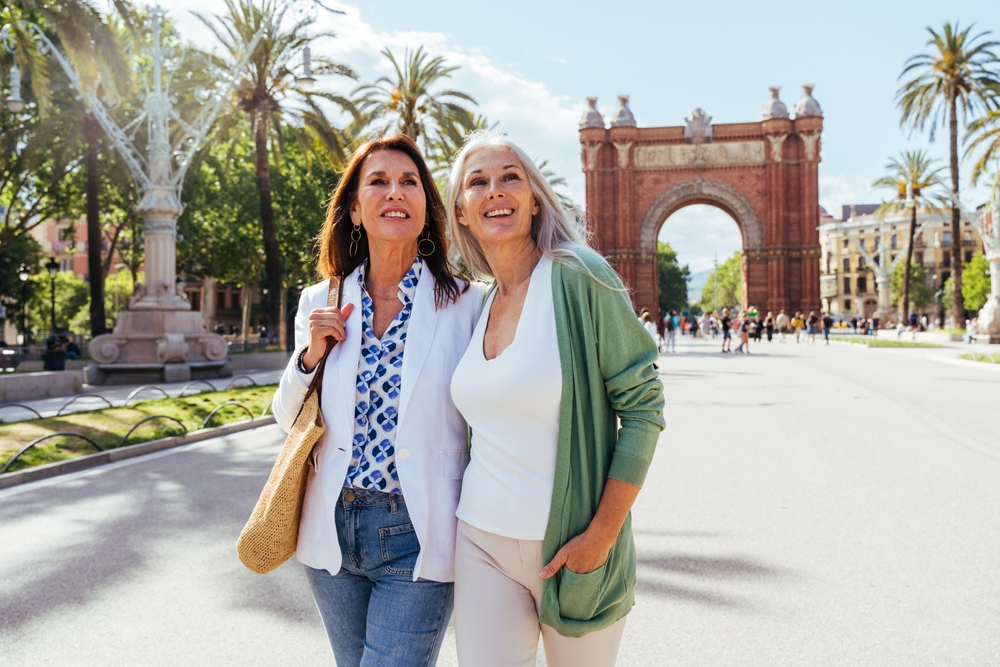 senior women bonding outdoors in the city