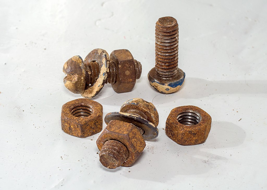 Close Up Photo of rusted bolts and nuts