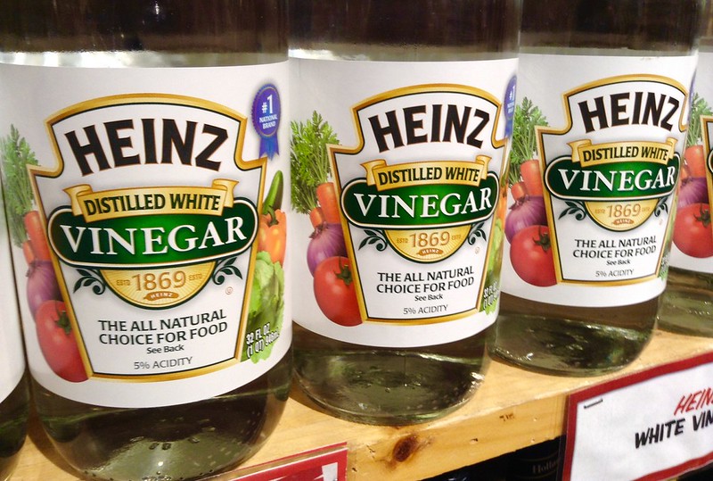 Close Up Photo of Heinz White Vinegar bottles placed