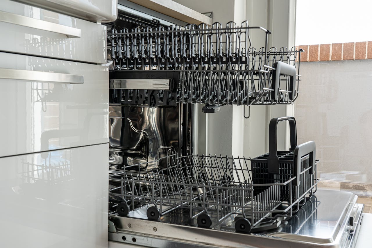 Close Up Photo of Empty Rack of Dishwasher