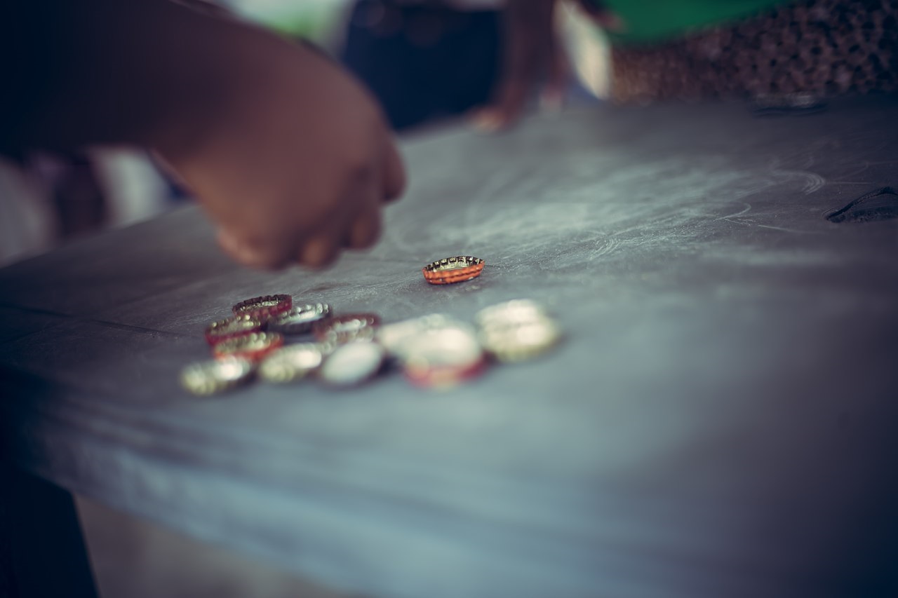 Crown corks are place on a table