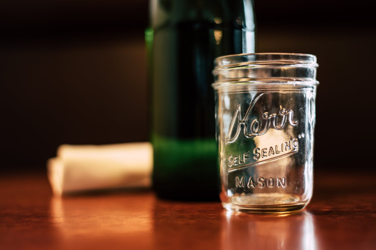 Empty glass jar as a drinking glass.